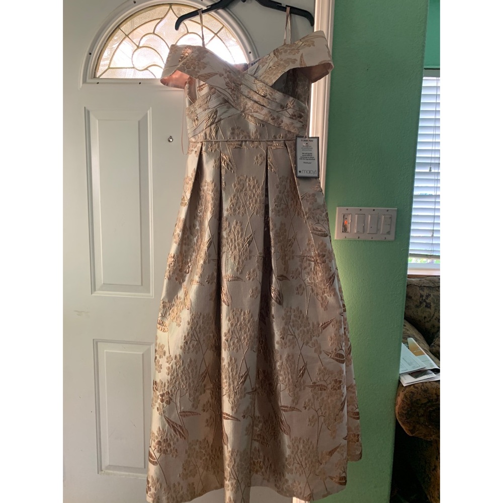 Metallic rose gold formal long dress.